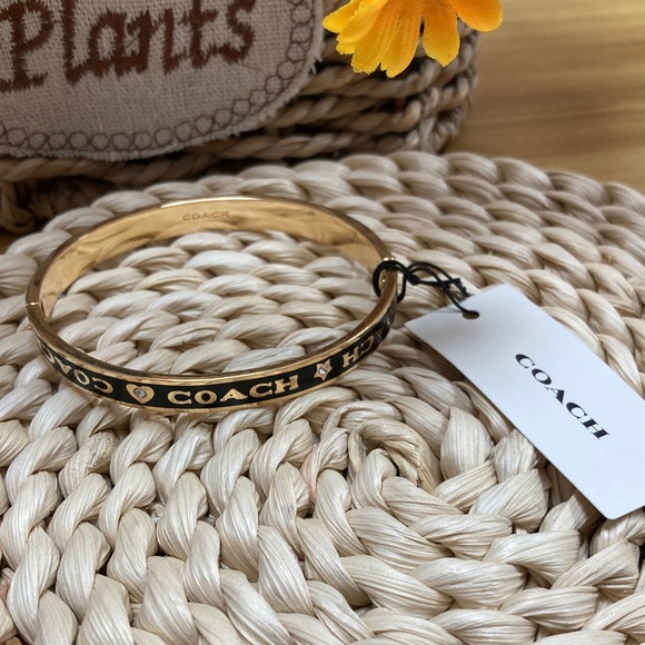 Coach Jewelry - Coach Gold and Black Logo Hinged Bangle bracelet